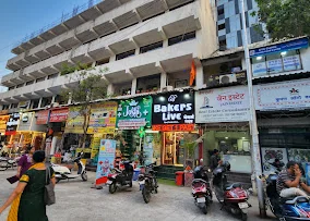 Bharat Plaza building and surrounding shops in Andheri East