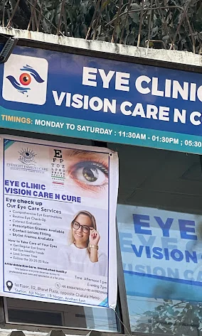 Vision Care n Cure clinic entrance and eye-care signage